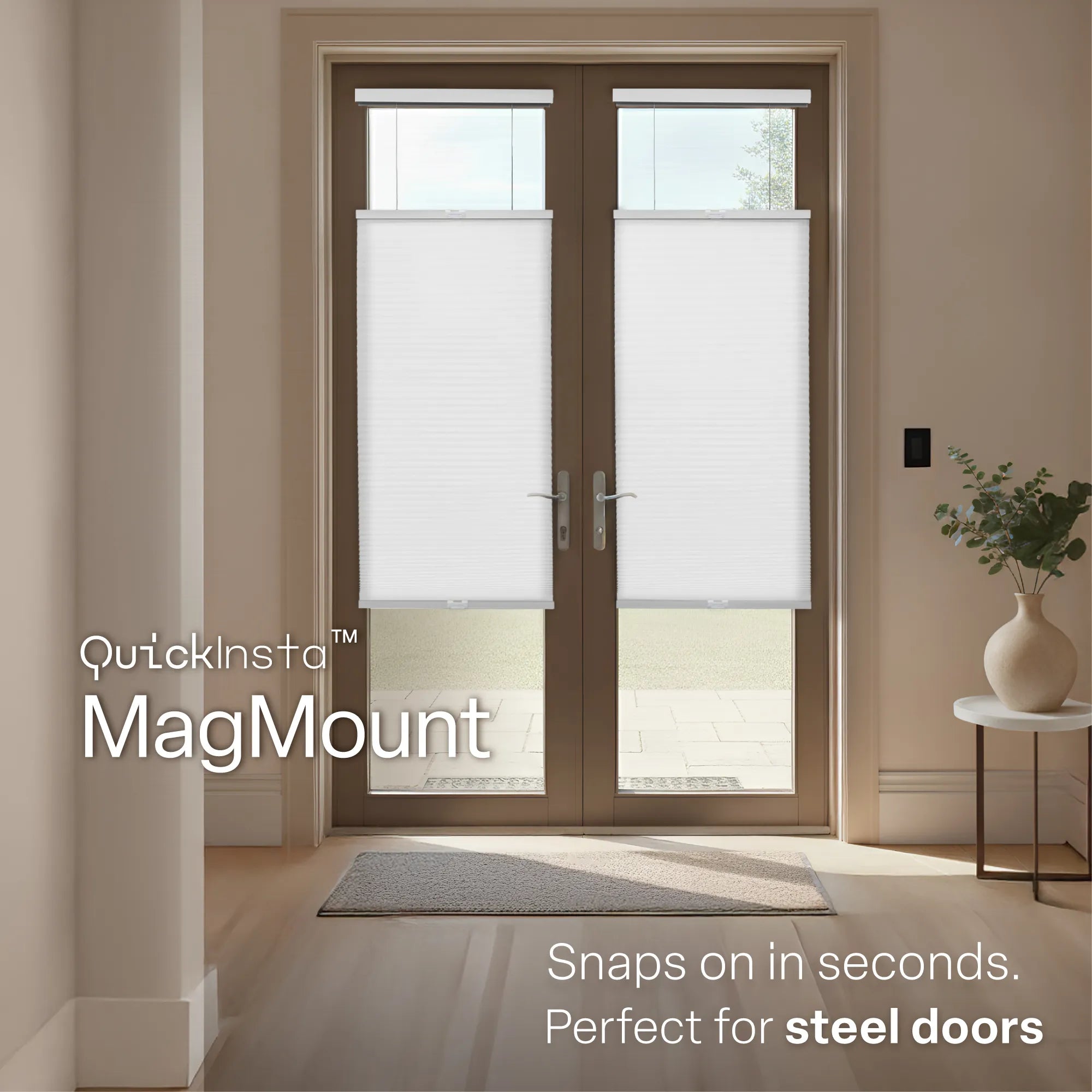 A bright, modern entryway featuring brown double French doors with white &