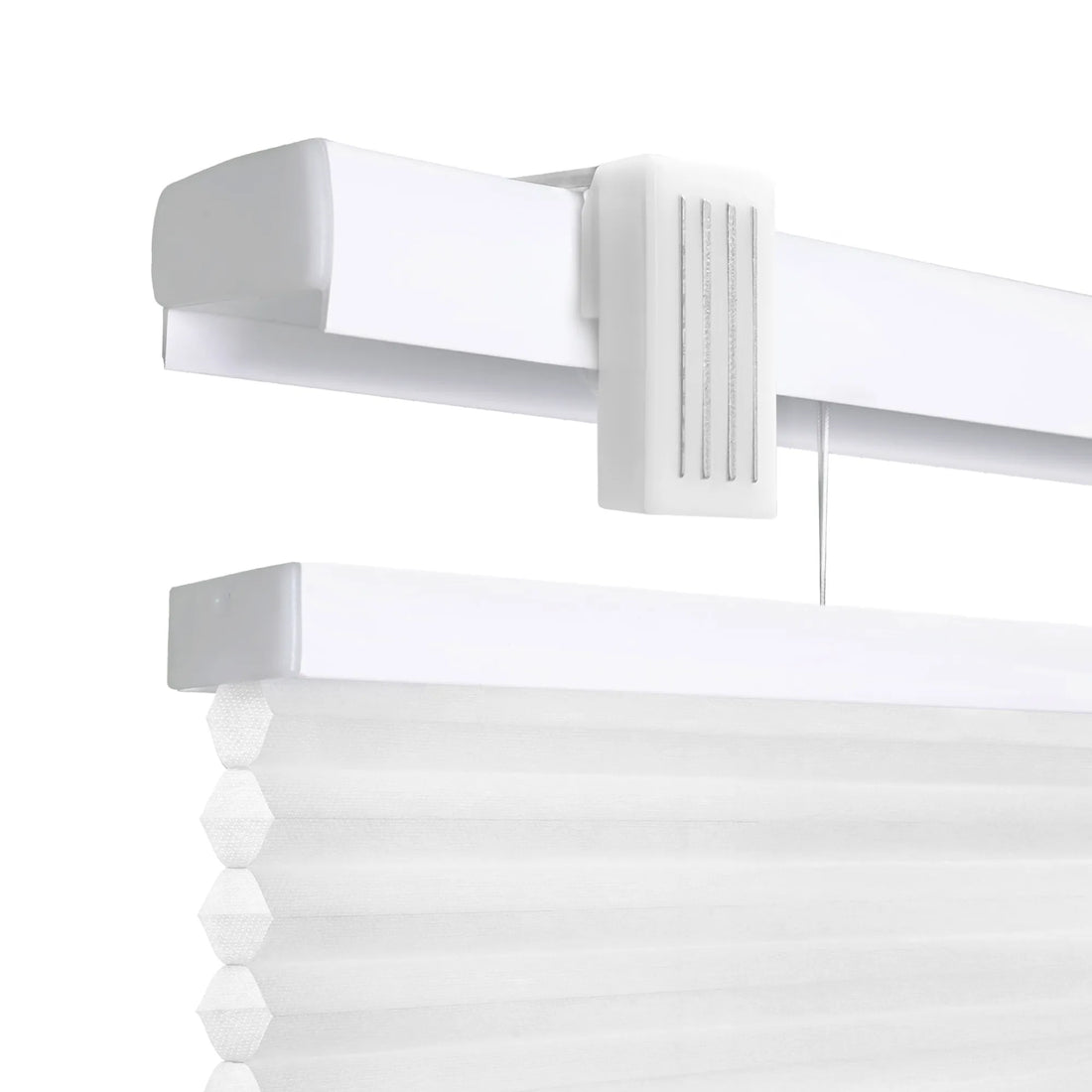 A high-resolution, close-up product shot of white cordless cellular honeycomb shades against a clean white background. The image highlights the top mounting rail and the textured, pleated fabric of the shade, showcasing the &