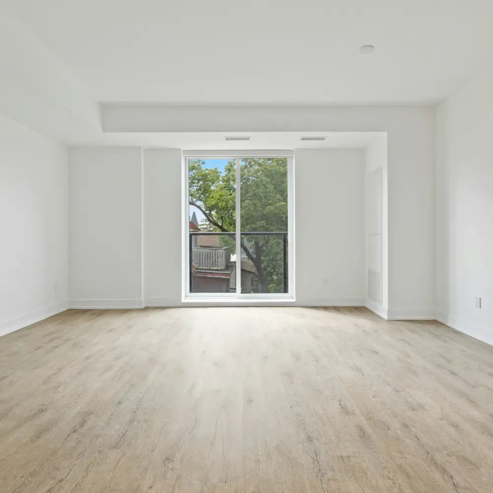 Empty apartment room with window highlighting need for renter-friendly no-drill blinds or shades for easy installation
