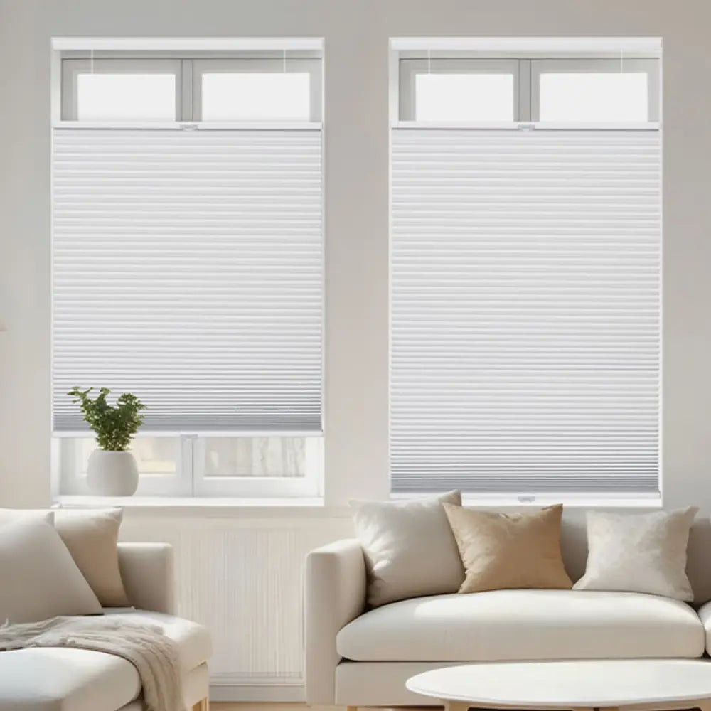 Top-down bottom-up shades on living room windows providing dual light control and privacy in modern interior